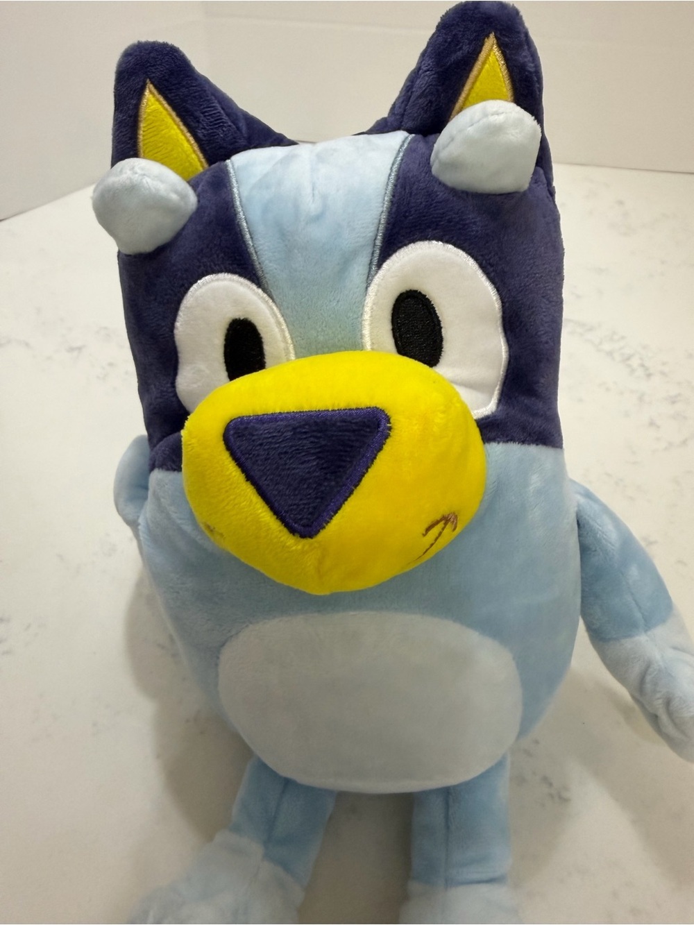 Lucy Blue and Yellow Plush Wolf Toy